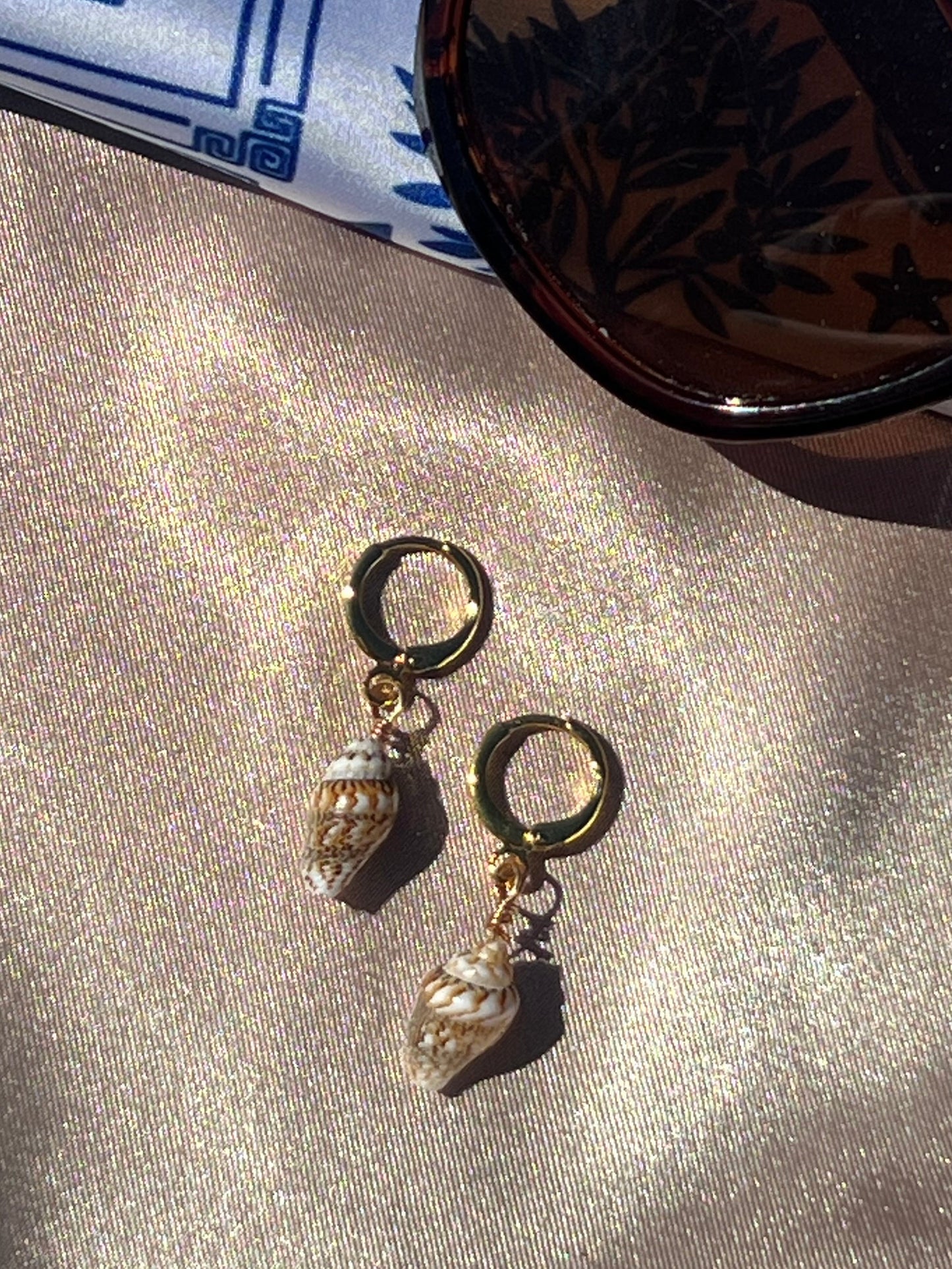 SHELL DANGLES