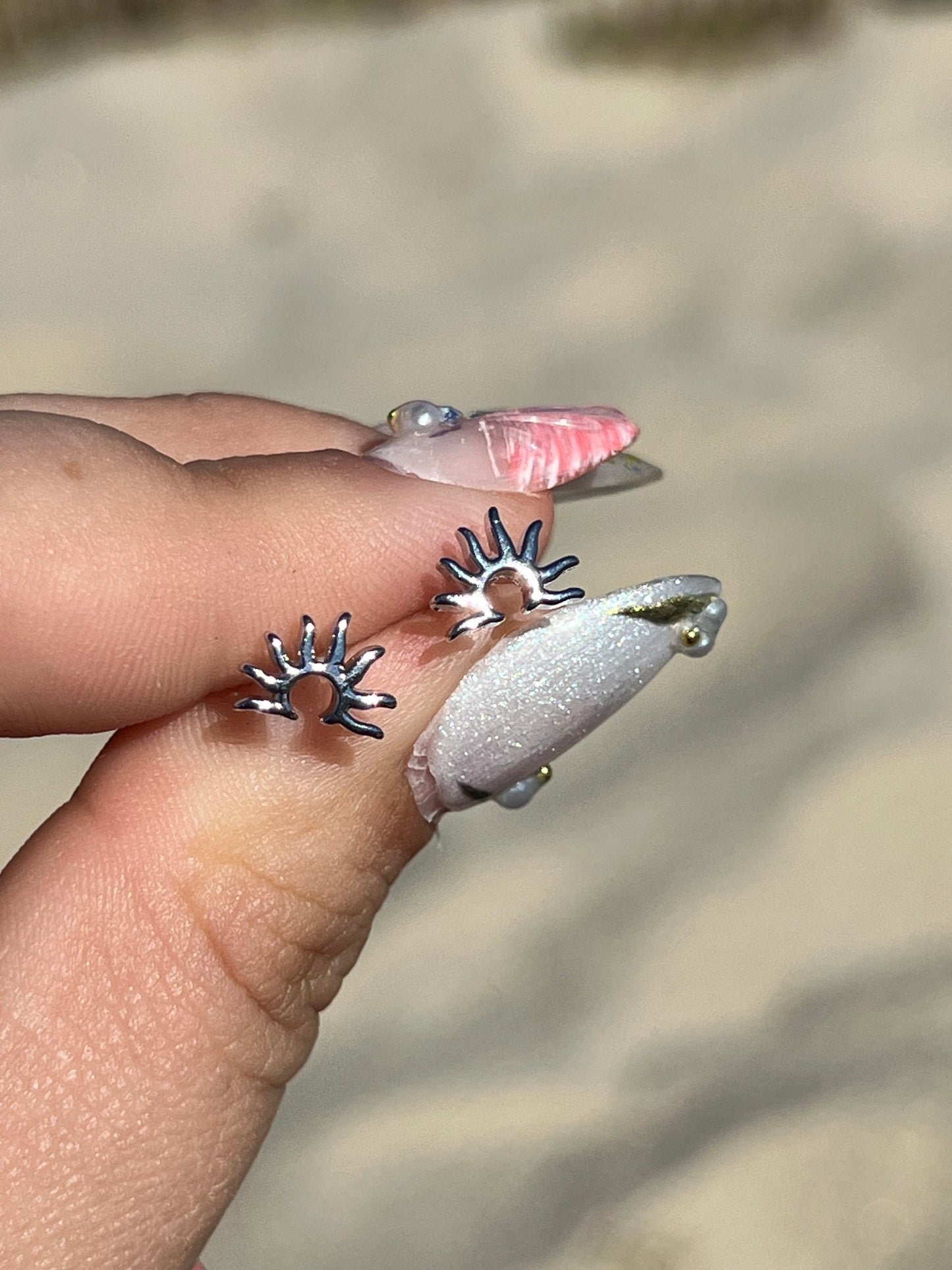 SUNSET STUDS
